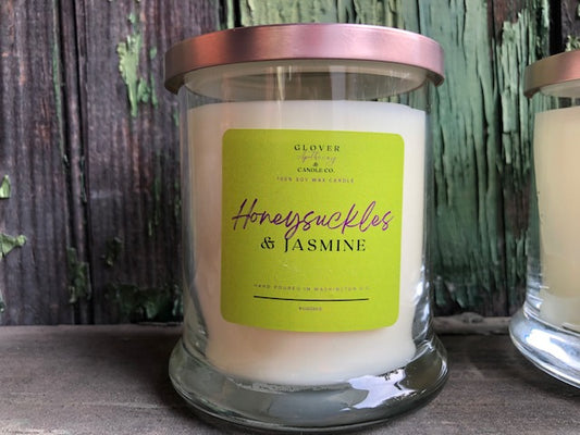 Our Honeysuckles & Jasmine soy candle is our wink to Spring time and the first blooms within a Spring garden. This is a simplistic, honey-sweet aroma of lemon, violet, honeysuckles, jasmine, fresh powder & wood. All candles are made with 100% soy wax. 